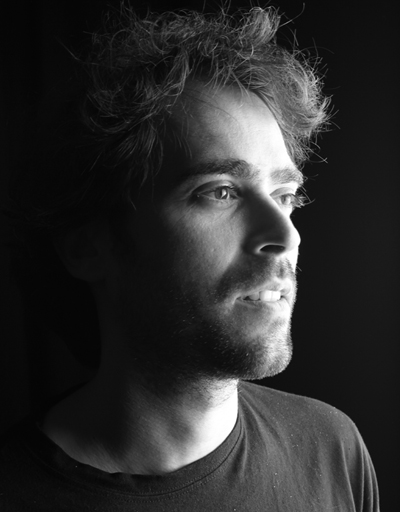 A black and white photograph of Hagai in a 3/4 profile.